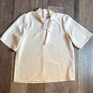 Elegant Cream Blouse with Bow Detail